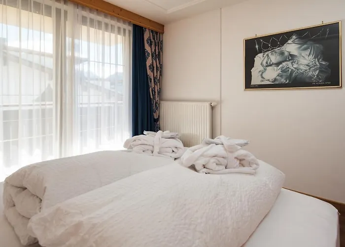 Hotel Garni Alpenruh-micheluzzi 4*